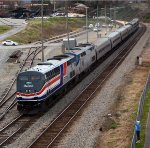 Amtrak #20 leaves Lynchburg and gets an enthusiastic wave from a trail walker